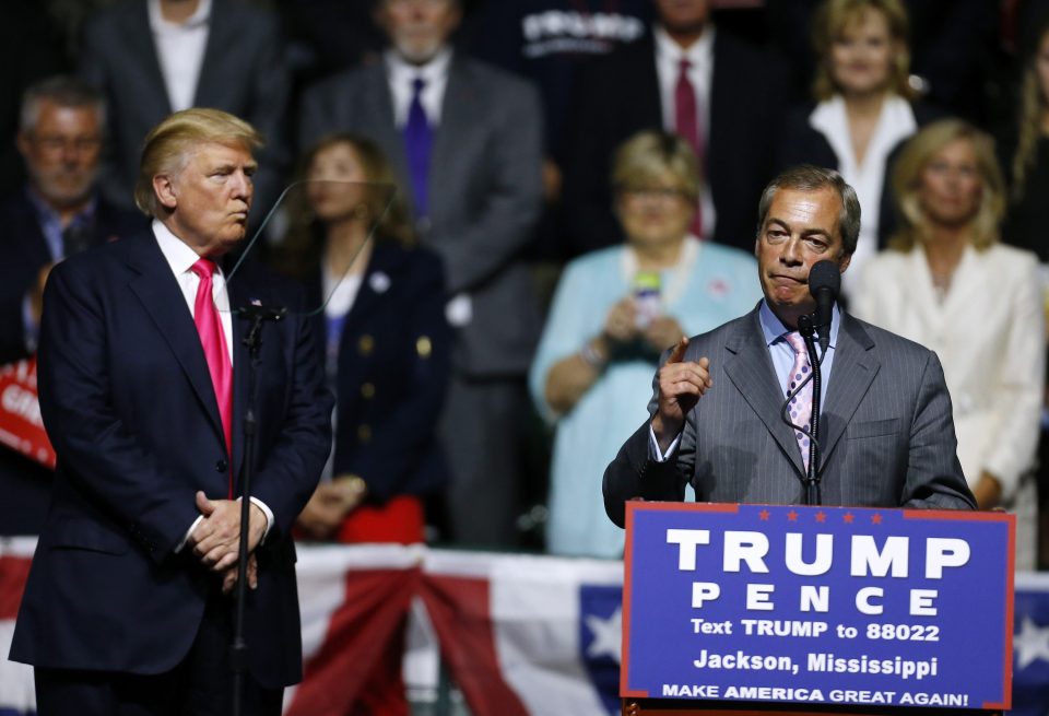 Donald Trump watches on as Nigel Farage speaks