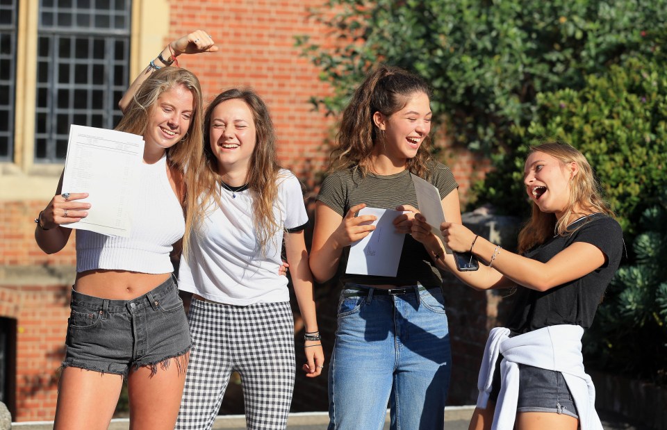  Pupils celebrate their GCSE results at Brighton College in Brighton, East Sussex as students up and down the country receive their results