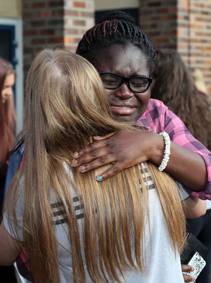  Yemi Oluwaleye celebrates her GCSE results with class mates at Methodist College in Belfast