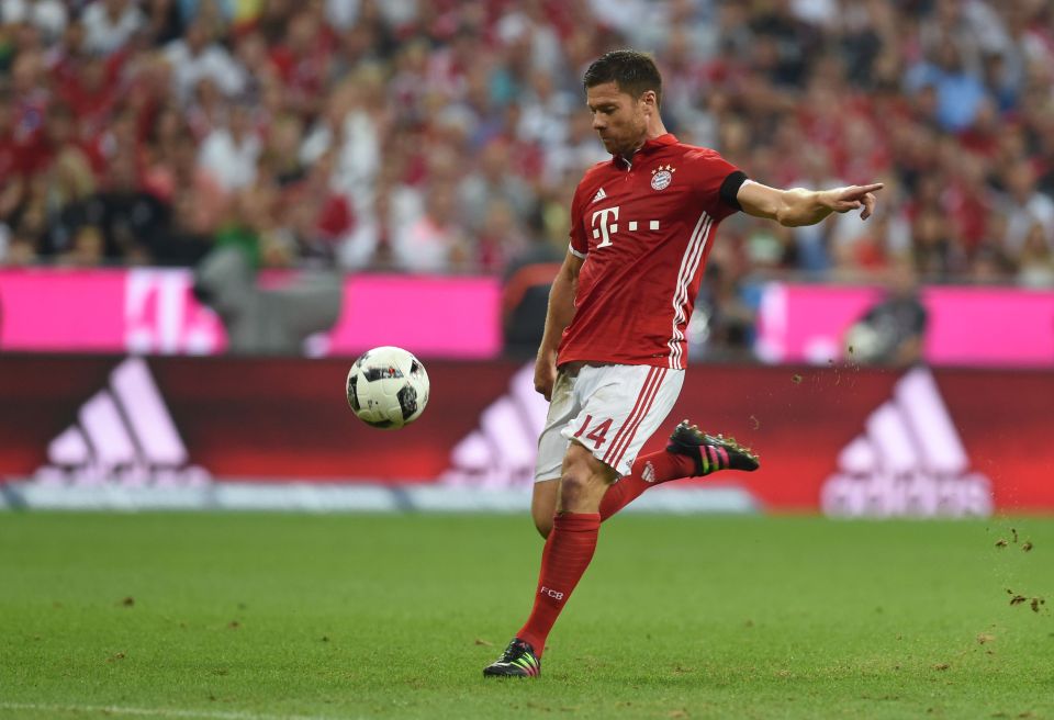  Xabi Alonso winds up to take a shot at goal against Werder Bremen