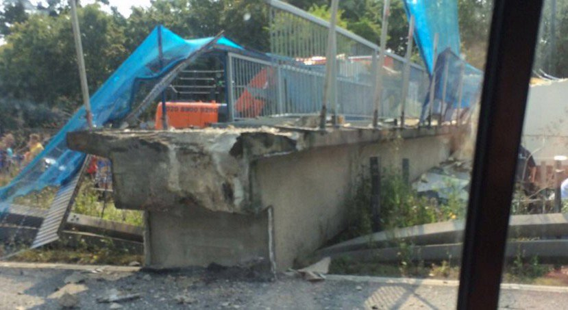  The structure toppled as lorries and cars passed below