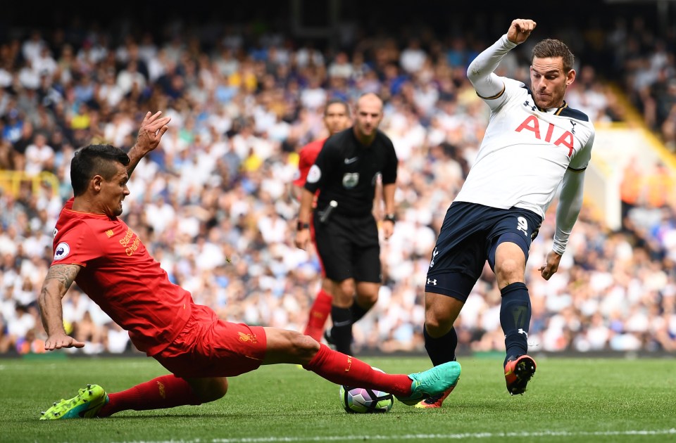 New Spurs striker Vincent Janssen battles Liverpool defender Dejan Lovren for the ball