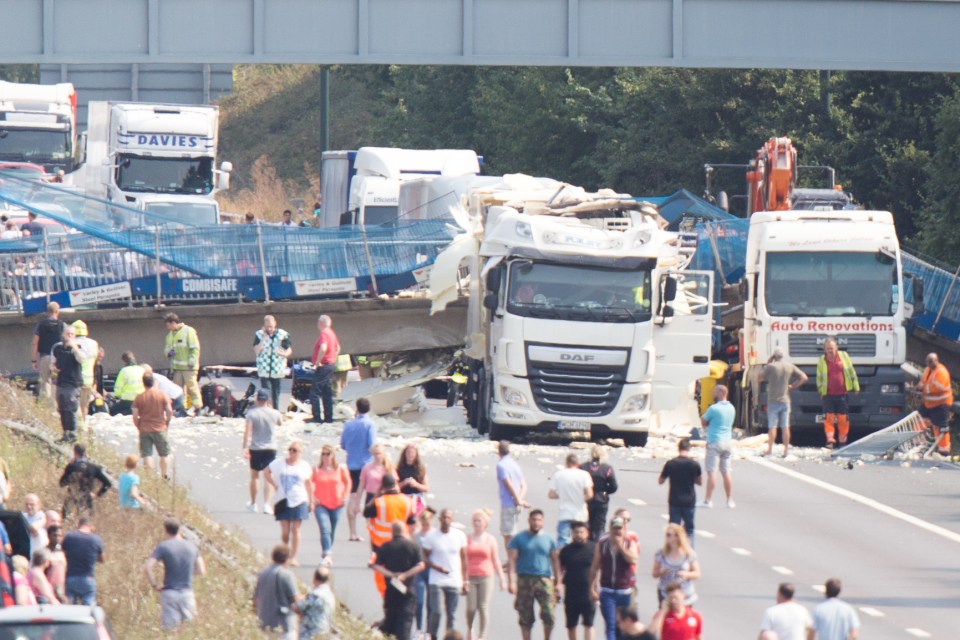  Motorists stepped out of their cars to examine the carnage