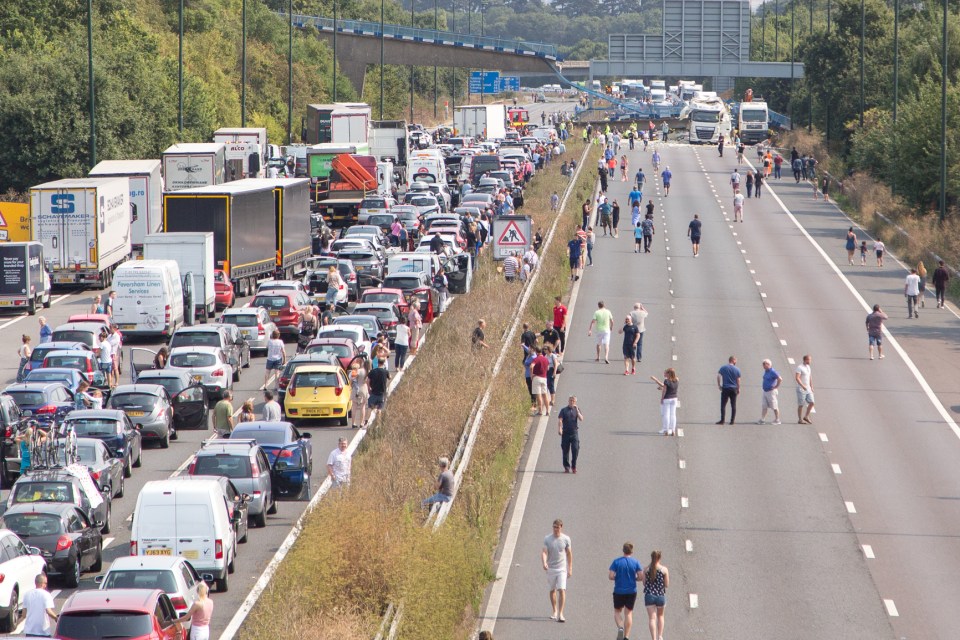  Thousands of day-trippers face being stuck on the M20 for up to SIX HOURS after cops closed the road in both directions