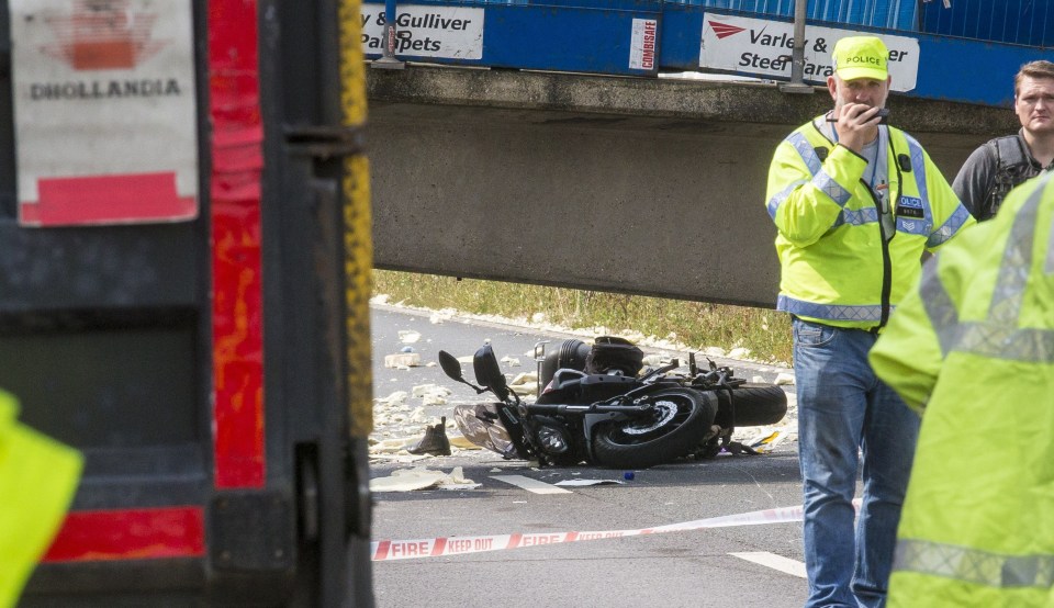  The motorcycle belonging to the 50-year-old man treated for broken ribs after being hit by falling debris