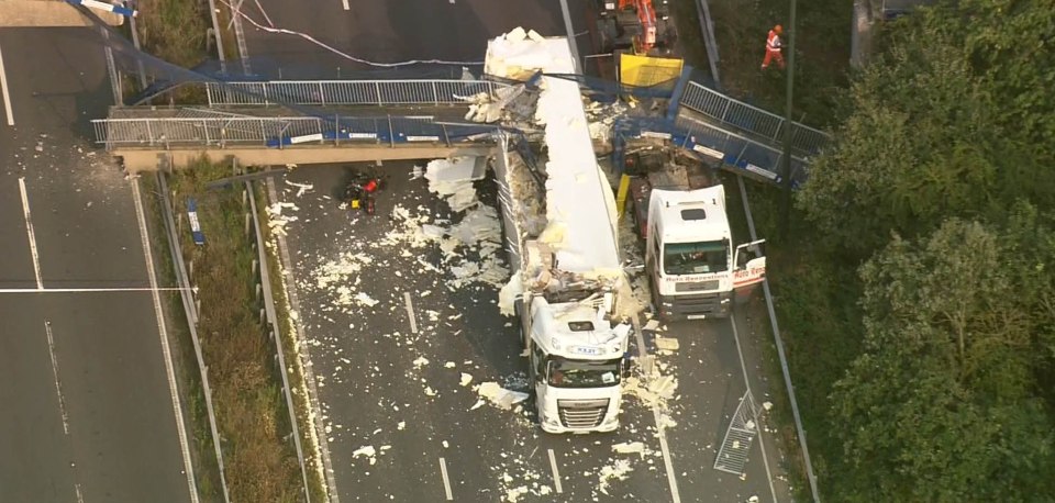 The motorcycle on its side after the Jim's great escape as the foot bridge collapsed