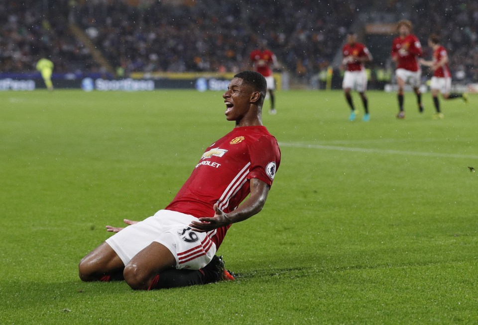  Marcus Rashford celebrates netting the late winner for Man United