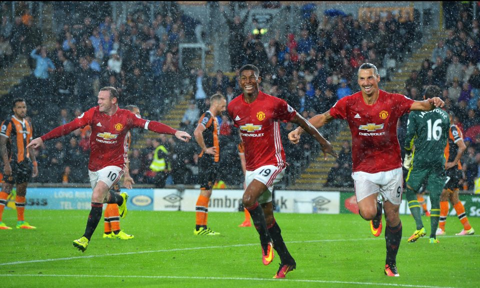 Rashford celebrates after scoring his first of the season