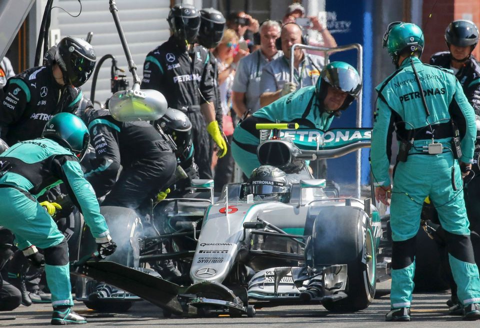  Mechanics work on Nico Rosberg‘s car during the Belgian Formula One Grand Prix at the Spa