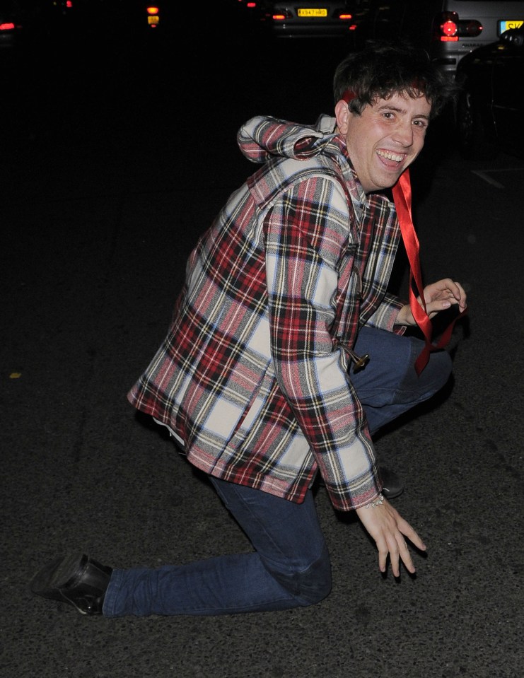  A cheeky Nick Grimshaw falls to the ground after a few bevvies