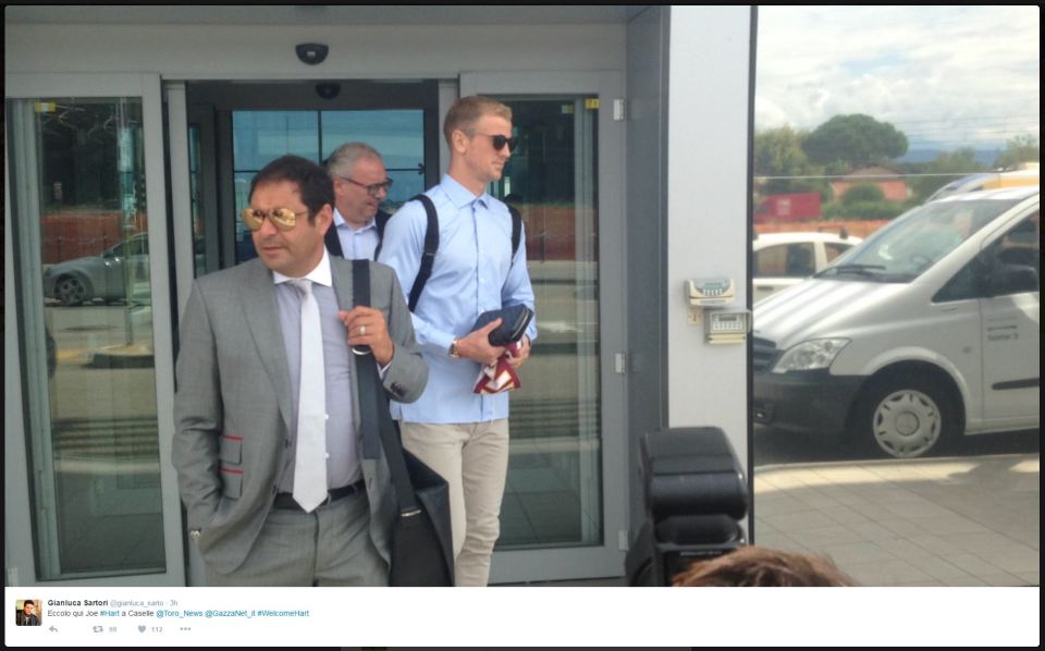 Joe Hart arrives at the airport in Turin today