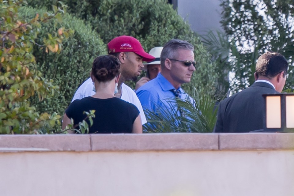  Chris Brown pictured at his L.A home minutes before the police confirmed he had been arrested