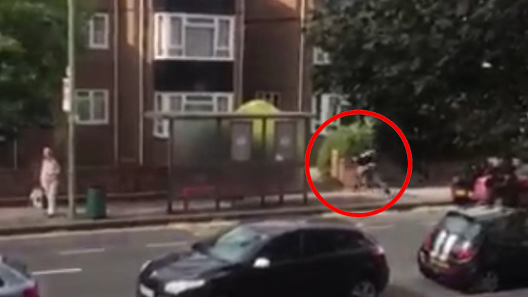 A man flees across a Penge street and into the front garden of a nearby property, tripping as he crosses the pavement