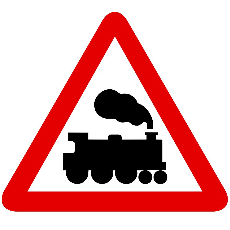 The red triangle with a train symbol indicates that a level crossing is approaching, and it is not closed off by a barrier or gate