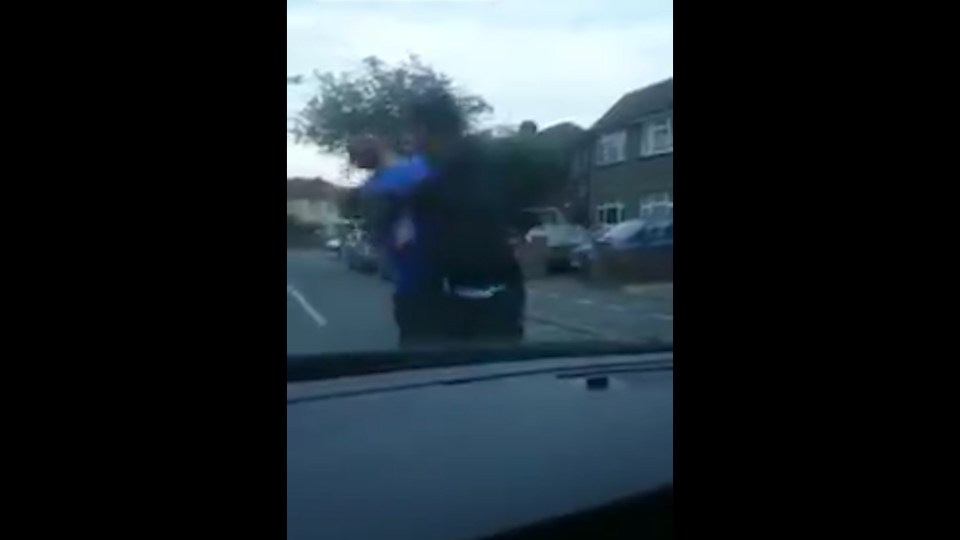 When the man refuses to budge, the driver appears knocks him out with one punch 