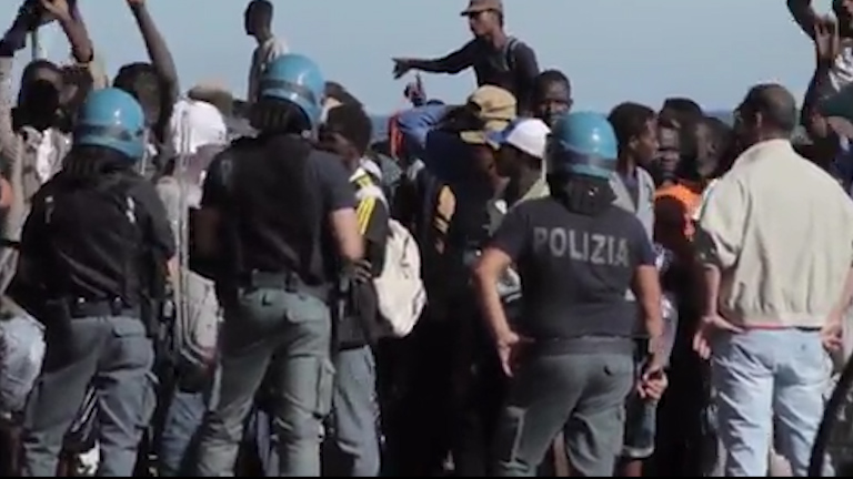 POLICE HALT MIGRANTS.00_00_32_20.Still002