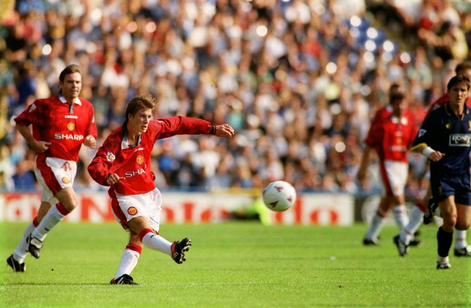 Football - Wimbledon v Manchester United - Premier League - Selhurst Park - 96/97 - 17/8/96 Manchester United's David Beckham scores the third goal for Manchester United from inside his own half Mandatory Credit: Action Images / Tony O'Brien