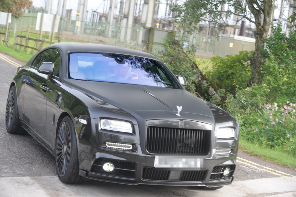  Memphis Depay drives in in his £250,000 Rolls Royce which attracts a lot of attention in Manchester