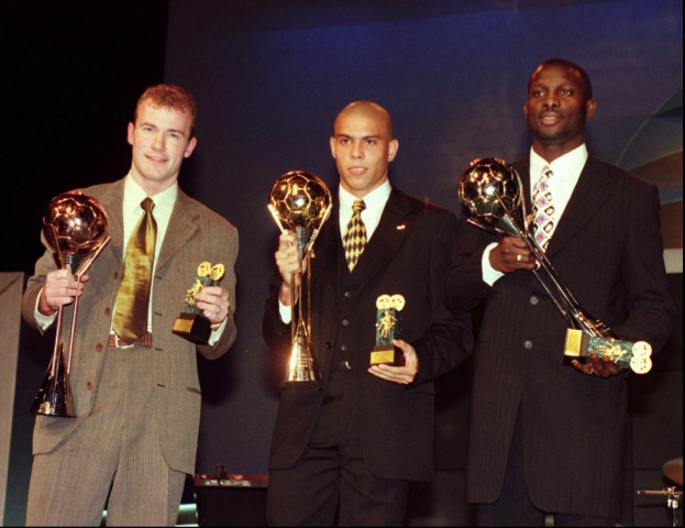 FIFA's three best players of the year, (from left to right) Britain's Alan Shearer, 3rd placed, Brazil's Ronaldo, best player, and Liberian George Weah, 2nd placed, pose with their trophies during an awards ceremony Monday January 20 1997 in Lisbon. (AP Photo/Luisa Ferreira)