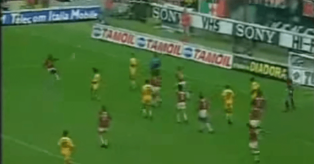 George Weah picks up the ball in his own box after Verona misplace corner