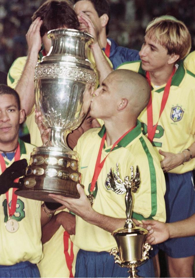  Ronaldo kisses the trophy as Brazil win the 1997 Copa America in Paraguay