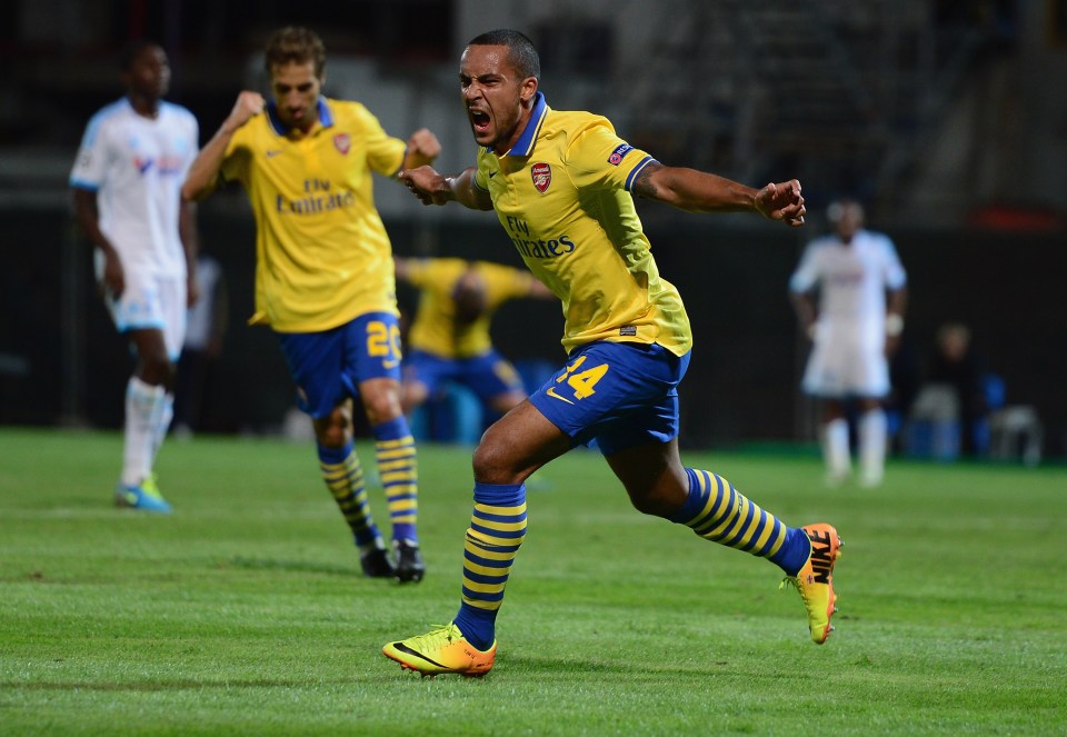 MARSEILLE, FRANCE - SEPTEMBER 18: Theo Walcott of Arsenal celebrates his goal during the UEFA Champions League group F match between Olympique de Marseille and Arsenal at Stade Velodrome on September 18, 2013 in Marseille, France. (Photo by Jamie McDonald/Getty Images)