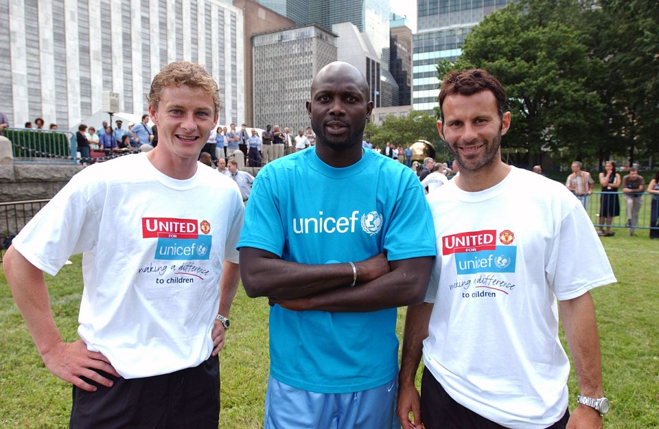 NEW YORK - JULY 29: Ole Gunnar Solskjaer and Ryan Giggs of Manchester United pose with George Weah at a UNICEF eventin New York on 29 July, 2003 on the third leg of their USA tour. (Photo by John Peters/Manchester United via Getty Images)