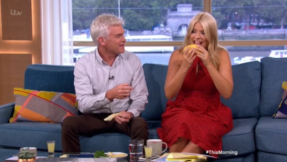  Holly bit into a lemon during the segment