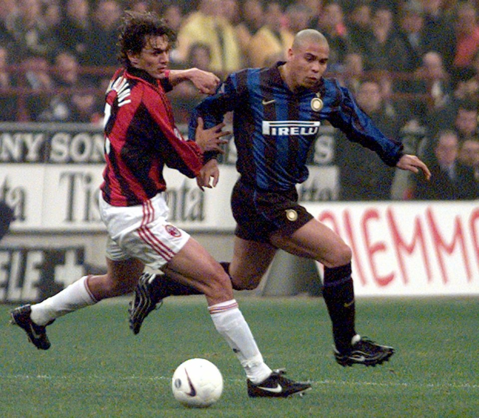  A battle of the ages between AC Milan's Paolo Maldini and Inter's Ronaldo