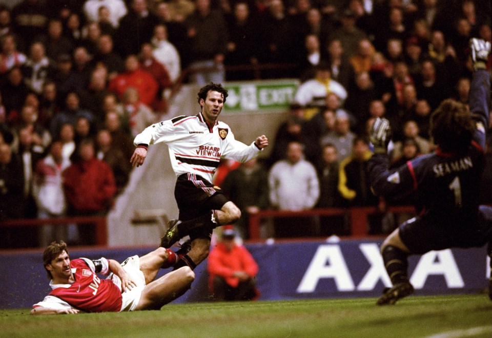 14 Apr 1999: Ryan Giggs of Manchester United beats the despairing lunge of Tony Adams of Arsenal to drive the ball past David Seaman to score the winner in the FA Cup Semi Final match played at Villa Park in Birmingham. Manchester United won the game 2-1 after extra-time. Mandatory Credit: Shaun Botterill /Allsport