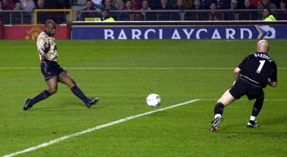 Pix: Ben Duffy/SWpix.com. Premiership Soccer-Manchester United v Arsenal..... 08/05/2002.COPYWRIGHT PICTURE>>SIMON WILKINSON>>01943 436649>>GOAL....Manchester's keeper Fabien Barthez cannot keep out the shot of Arsenal's Sylvain Wiltord