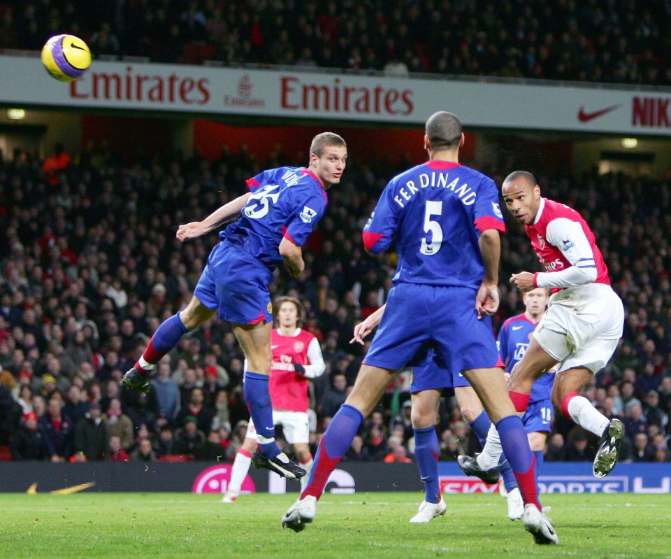 Arsenal v Manchester United (2-1) Arsenal's French striker Thierry Henry (R) watches the ball fly toward the goal for a last minute winner next to Manchester United's Nemanja Vidic (C) and team-mate Rio Ferdinand (2ndR) during their Premiership football match at The Emirates Stadium in London, 21 January 2007. Arsenal won the game 2-1 after two late second half goals from Henry and Robin van Persie. AFP PHOTO ADRIAN DENNIS Mobile and website uses of domestic English football pictures subject to subscription of a license with Football Association Premier League (FAPL) tel : +44 207 298 1656. For newspapers where the football content of the printed and electronic versions are identical, no licence is necessary.(Photo credit should read ADRIAN DENNIS/AFP/Getty Images)