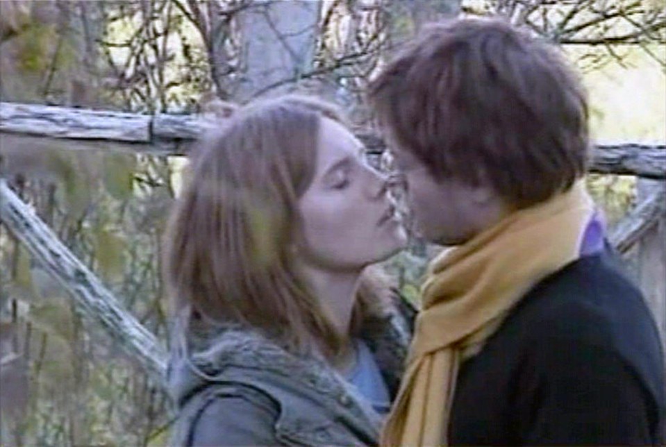  Knox and Sollecito were pictured kissing short;y after the murder