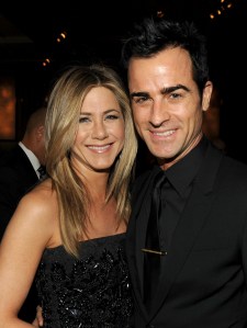  The actor's ex Jennifer Aniston, seen here with husband Justin, reportedly told pals the split was "karma" catching up with Angelina