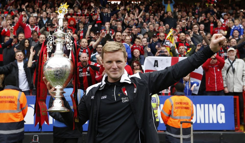 Eddie Howe lifts the Championship trophy back in May 2015