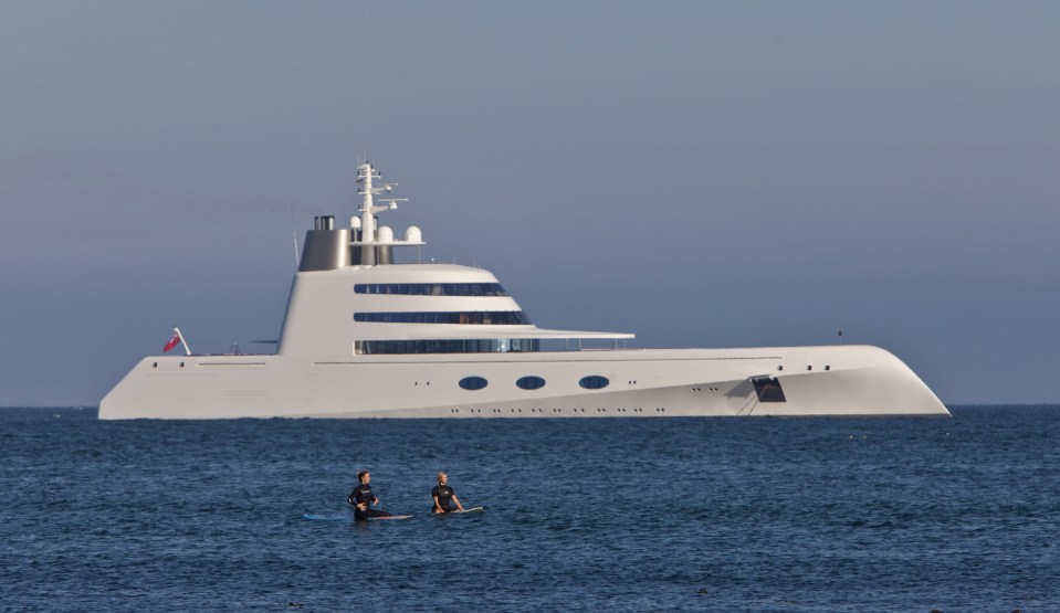 anchored off California's Malibu coast. The uniquely shaped yacht features an all-white 2,583-square-foot master suite wrapped in bomb-proof 44-milimeter glass