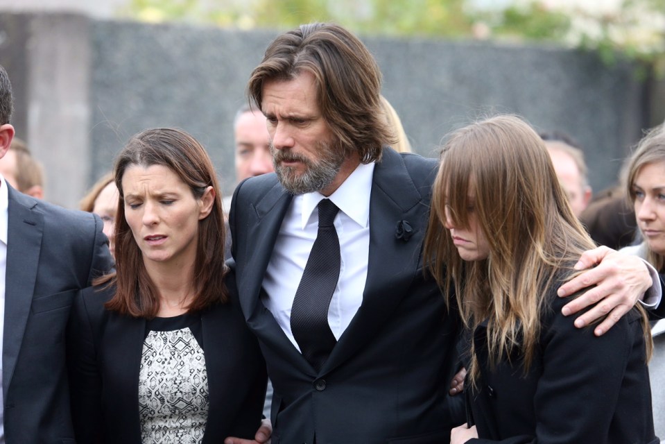  Jim Carrey with Cathriona's sister Lisa in the white top and Jane Erin Carrey , Jim's daughter at Cathriona White 's funeral