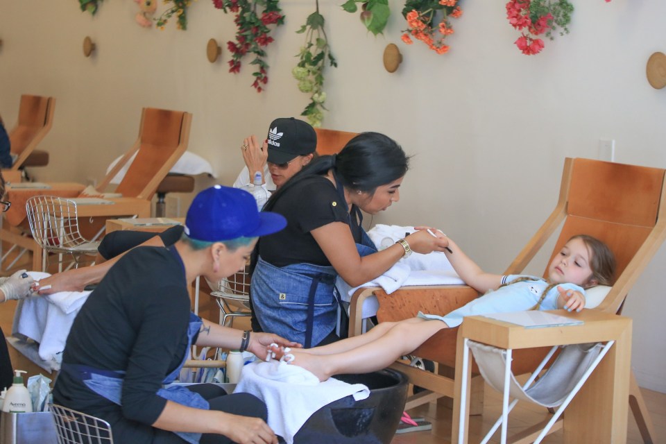  The Beckhams' daughter Harper looked like a prima-donna getting a mani and pedi