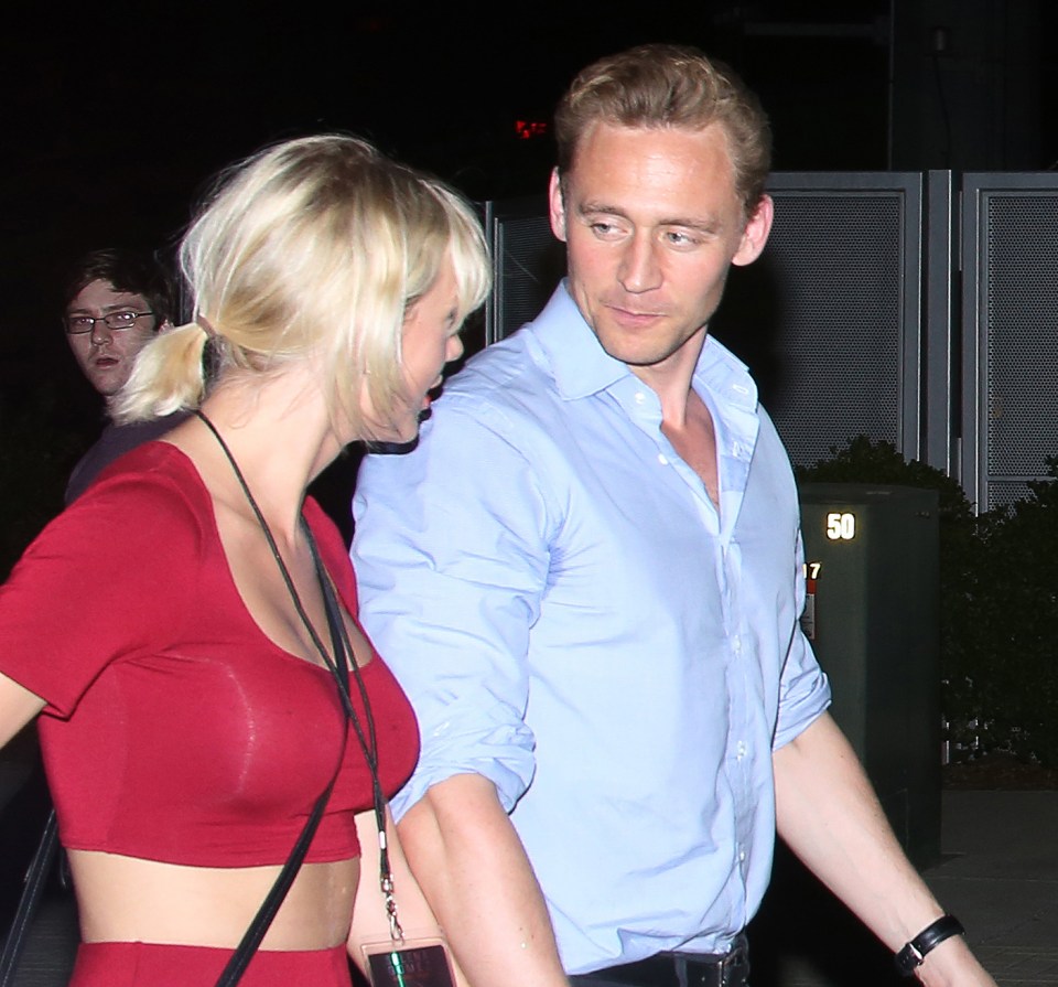 Smouldering looks . . . Taylor and Tom on a red-hot date in Nashville, June 21