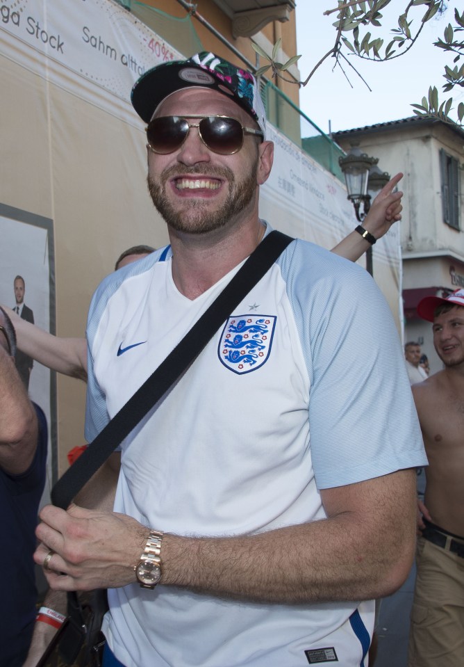 Fury joined England fans in France after the fight was postponed for the first time