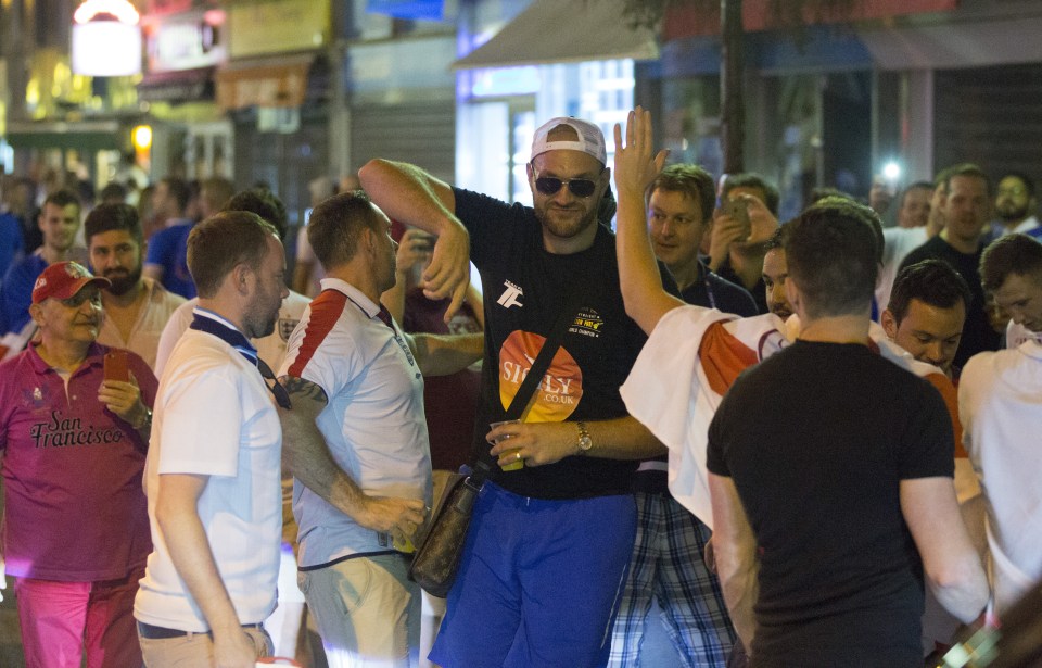 Tyson Fury walks round Nice after England lose to Iceland. There are now fears he may not box again