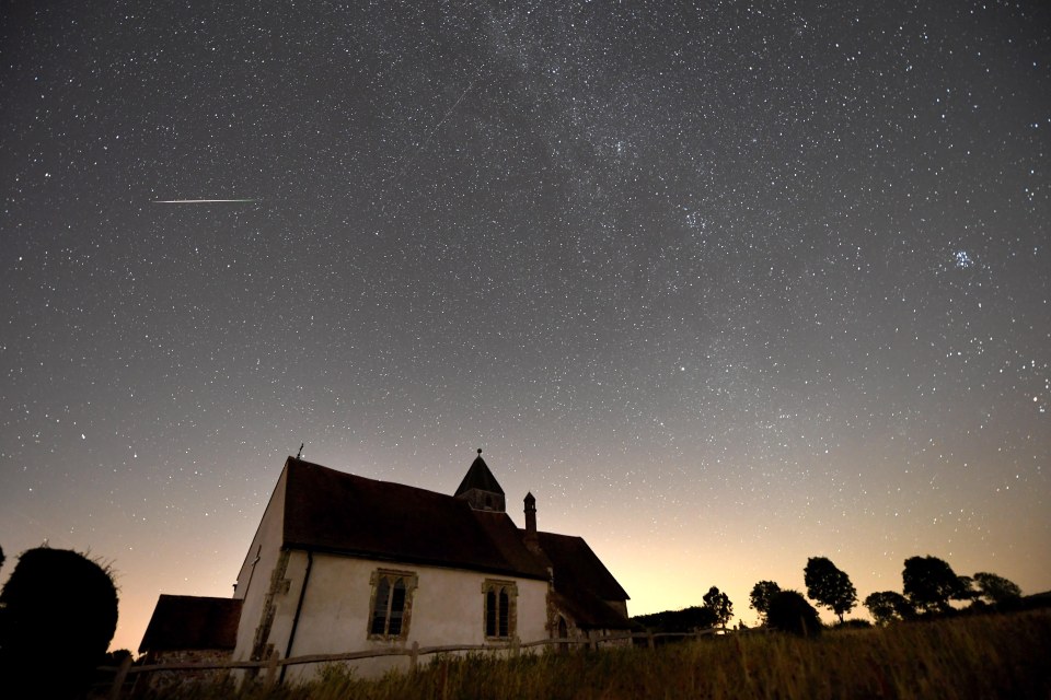  Meteor showers take place when space rocks, also known as meteoroids, enter the earth’s atmosphere. Pictured is the Perseid Meteor shower over St Hubert's Church, Idsworth