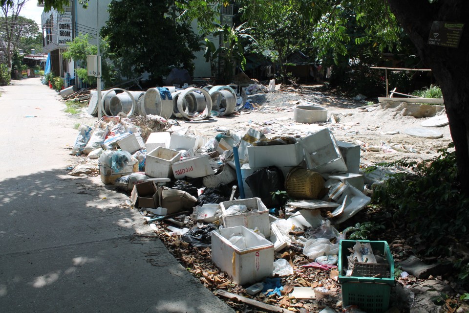  Shocking images show beaches filled with rubbish and half-finished buildings