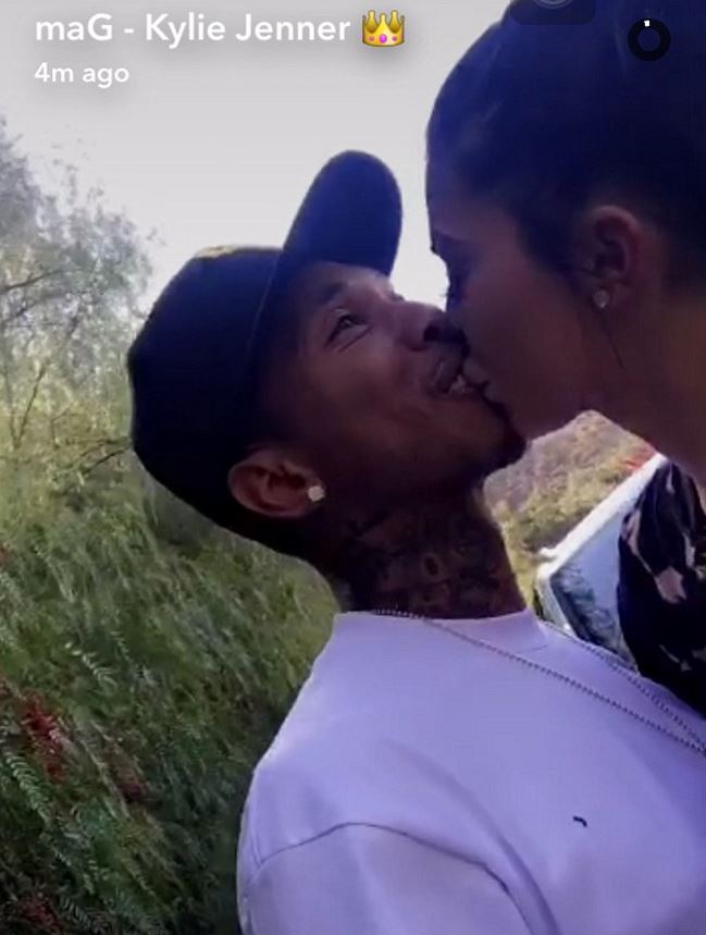  Kylie's surprise gift was rewarded with a kiss