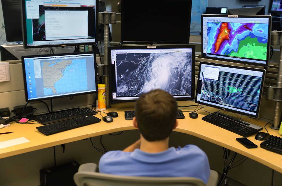  Eric Blake works at the National Hurricane Center to track the path of Hermine