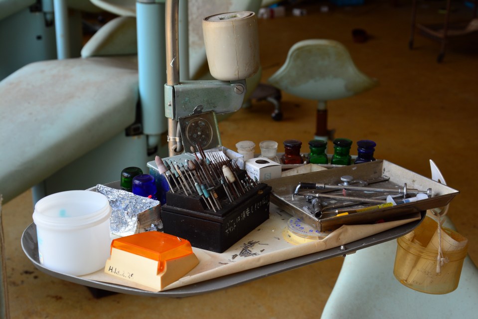 A complete set of equipment at a dentist's chair in an abandoned hospital in the south of Japan