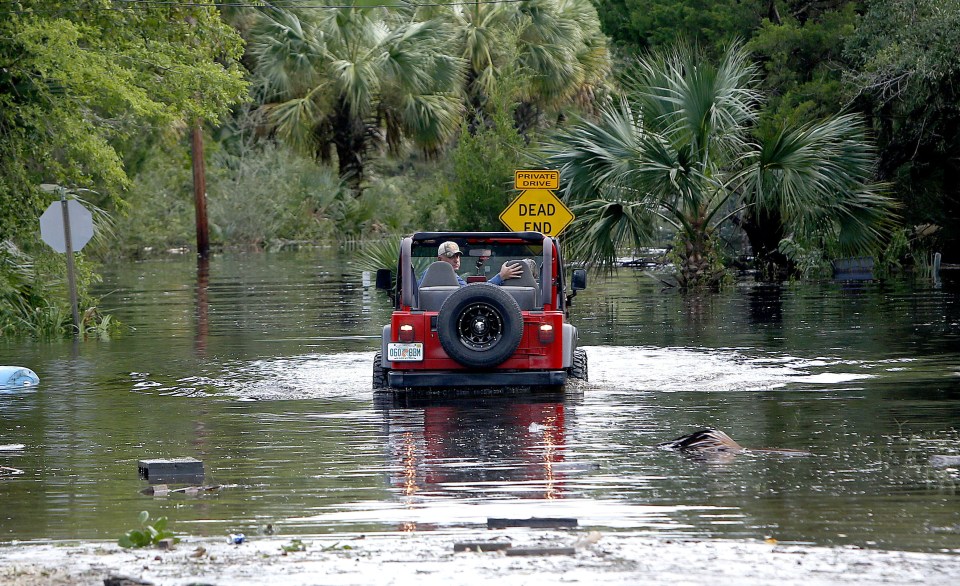  A driver changes his mind after trying to tackle high floodwaters in Steinhatchee