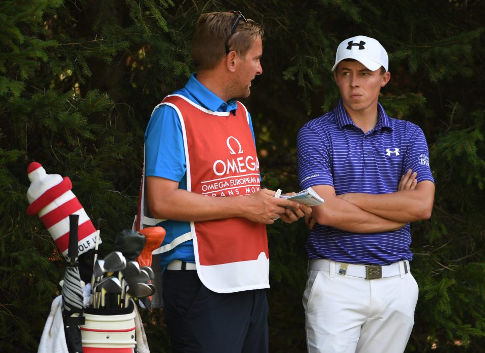  Matt Fitzpatrick chats to caddie Jamie Lane during the Omega European Masters