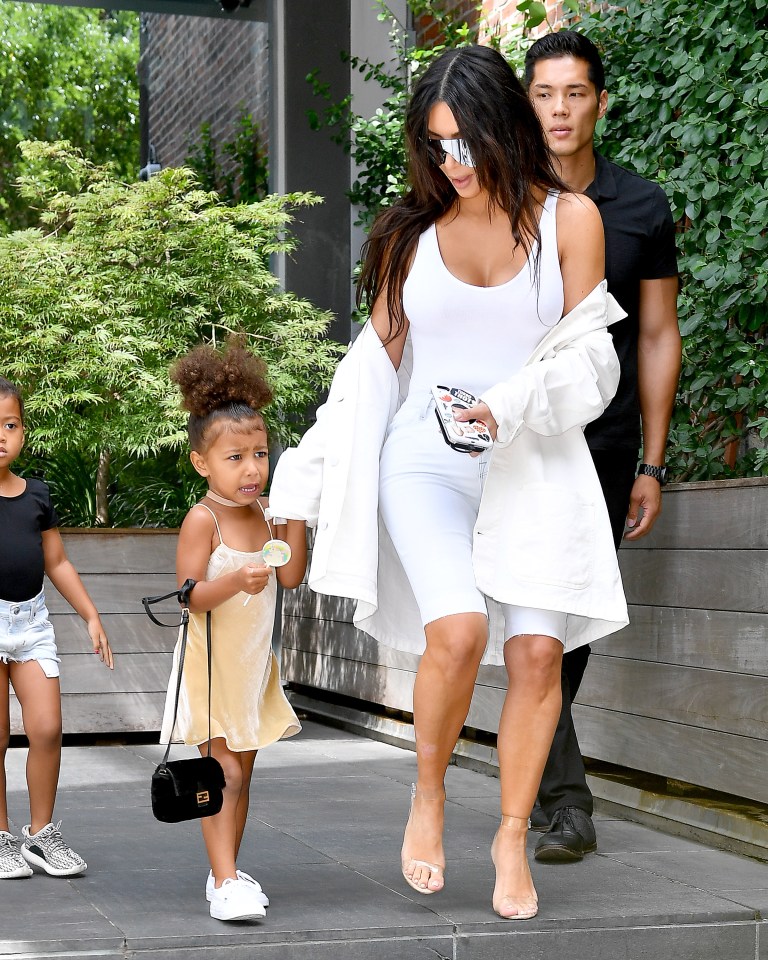  North is as fashionable as her mum as she carries a $2000 Fendi purse