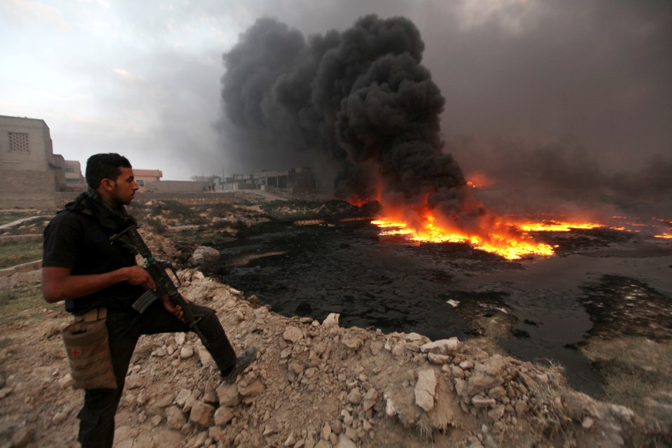  ISIS set fire to oilfields near the northern town of Qayyarah as they retreated from the Iraqi army